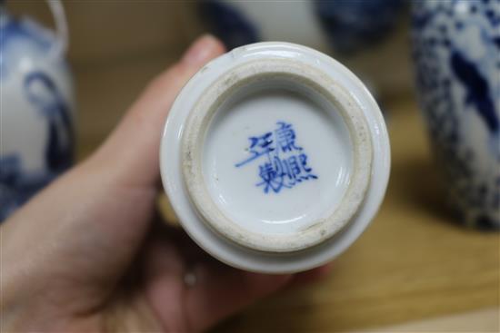 A Chinese blue and white bowl, liner and cover and three vases